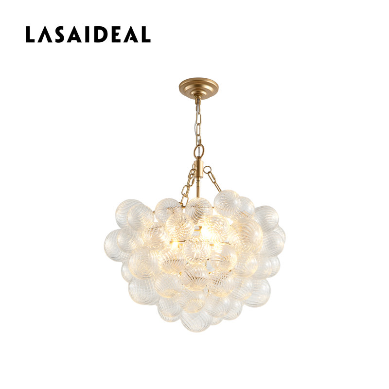 Luminaire suspendu doré réglable en hauteur 20 po avec abat-jour sphérique en verre transparent filé (ampoule non incluse)