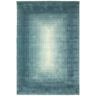 Tapis bleu / blanc en laine touffeté à la main