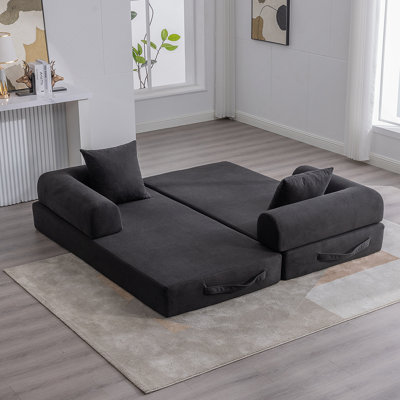 Canapé pliable et compressible avec structure en métal robuste pour les petits espaces, alliant design moderne et flexibilité modulaire.