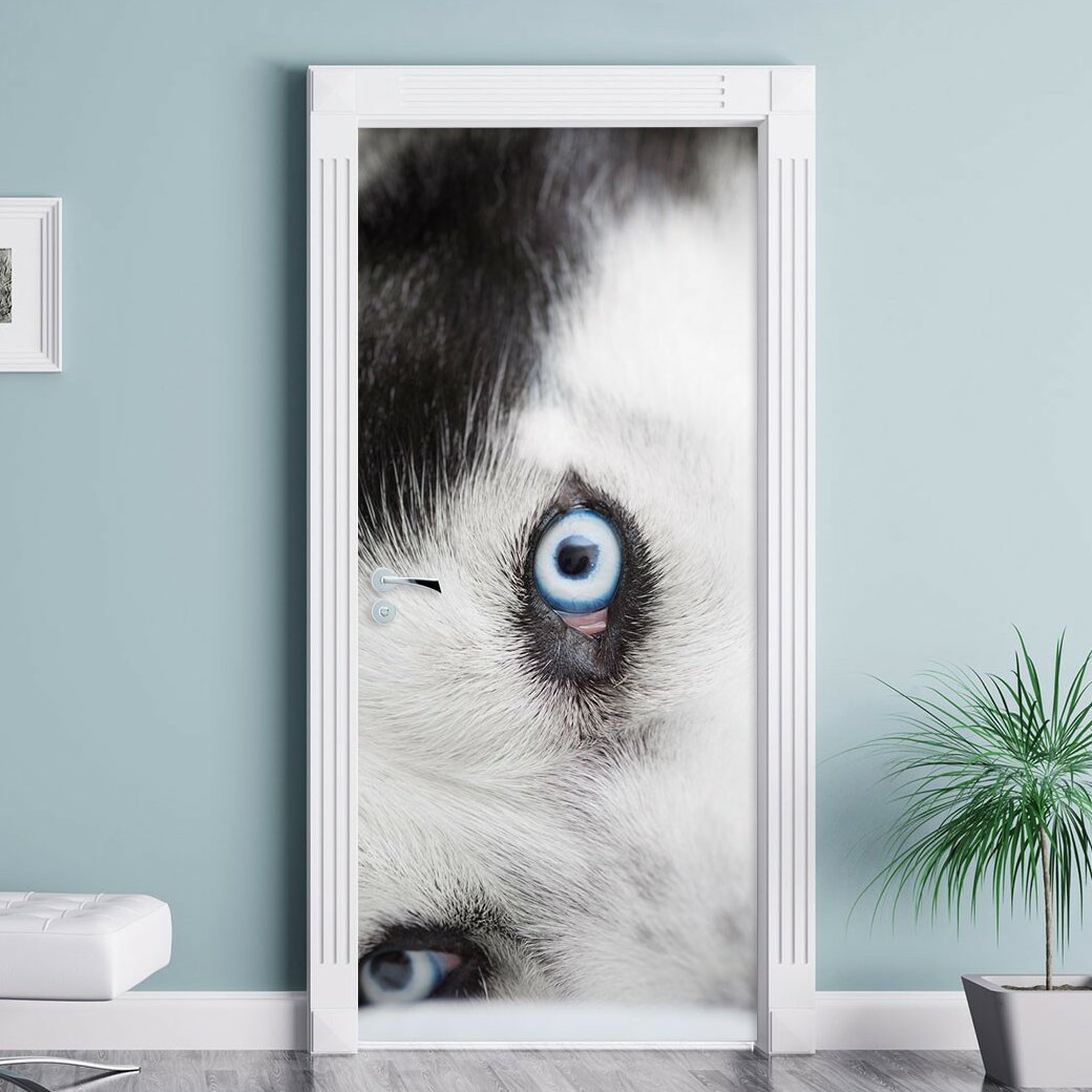 Türaufkleber Husky mit Eisblauen Augen im Bett