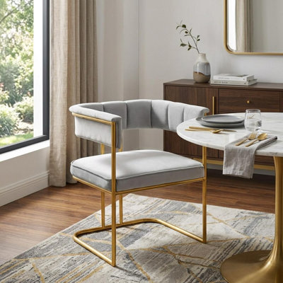 Chaise de salle à manger rembourrée grise et dorée