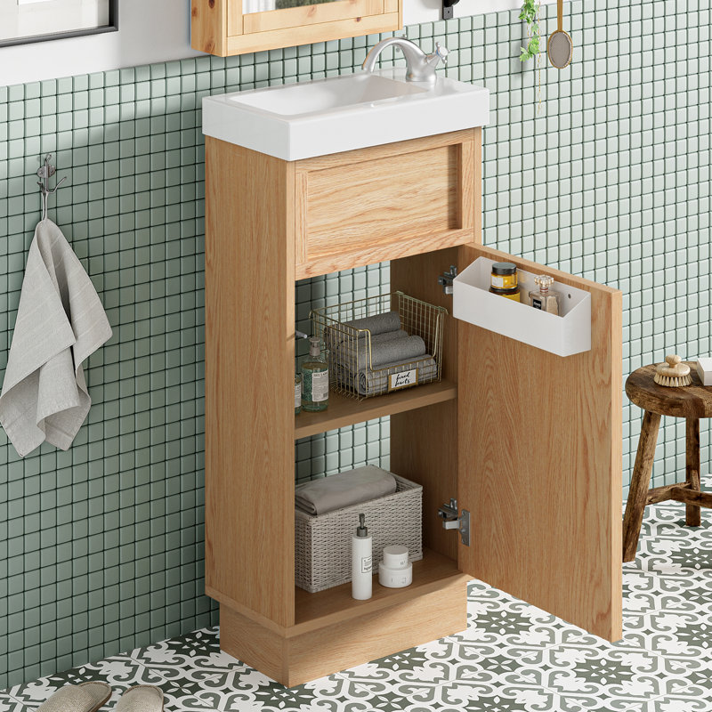 Meuble-lavabo de 15,75 po avec lavabo réversible en résine, armoire en panneau de fibres à densité moyenne avec tablette réglable et porte à pousser, finition en mélamine grain de bois, porte réversible, style rustique pour petits espaces