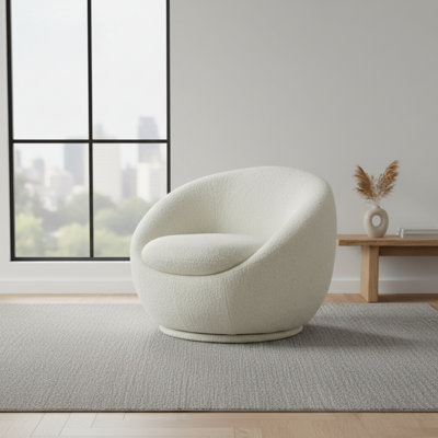Chaise longue pivotante en laine crème, confortable et polyvalente.