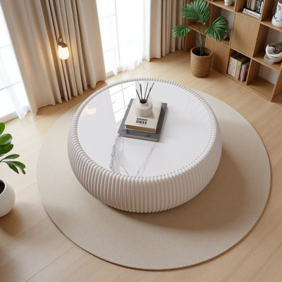 Table basse moderne en cuir fritté clair en forme de tambour pour les meubles de salon (chaque plateau possède un motif gris unique)