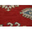 Tapis rouge à motif oriental Kazak