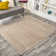 Asami Solid Low-Pile Beige Rug