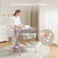 Table à langer portable pliante avec roulettes et surface imperméable-124550811