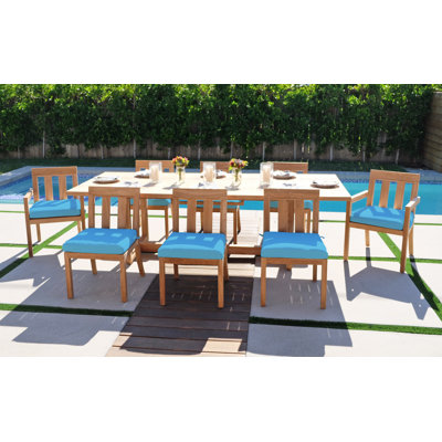 Crelake Rectangular 8 - Person Teak Expansion Table Dining Set with Sunbrella Cushions