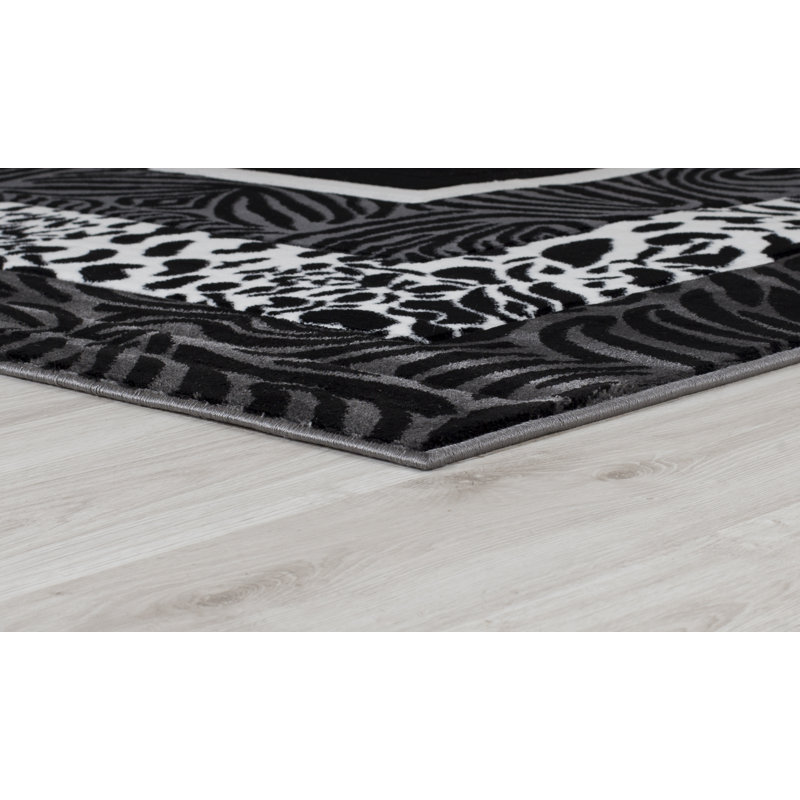 Tapis noir / gris Gerania Southwestern, Rond 8 pi 1 po