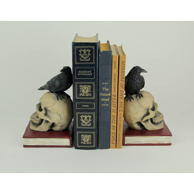 Gothic Evil Omen raven on skull resin decorative bookend set with black, beige and brown finish — 7 in. H x 4.5 in. L x 4 in. W