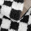 Tapis noir / blanc Atiray-87332710