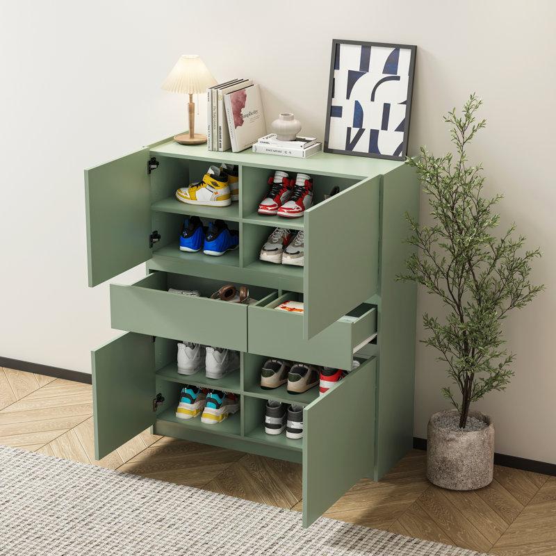 Armoire de rangement en bois avec 4 portes et 2 tiroirs Westervelt, Vert
