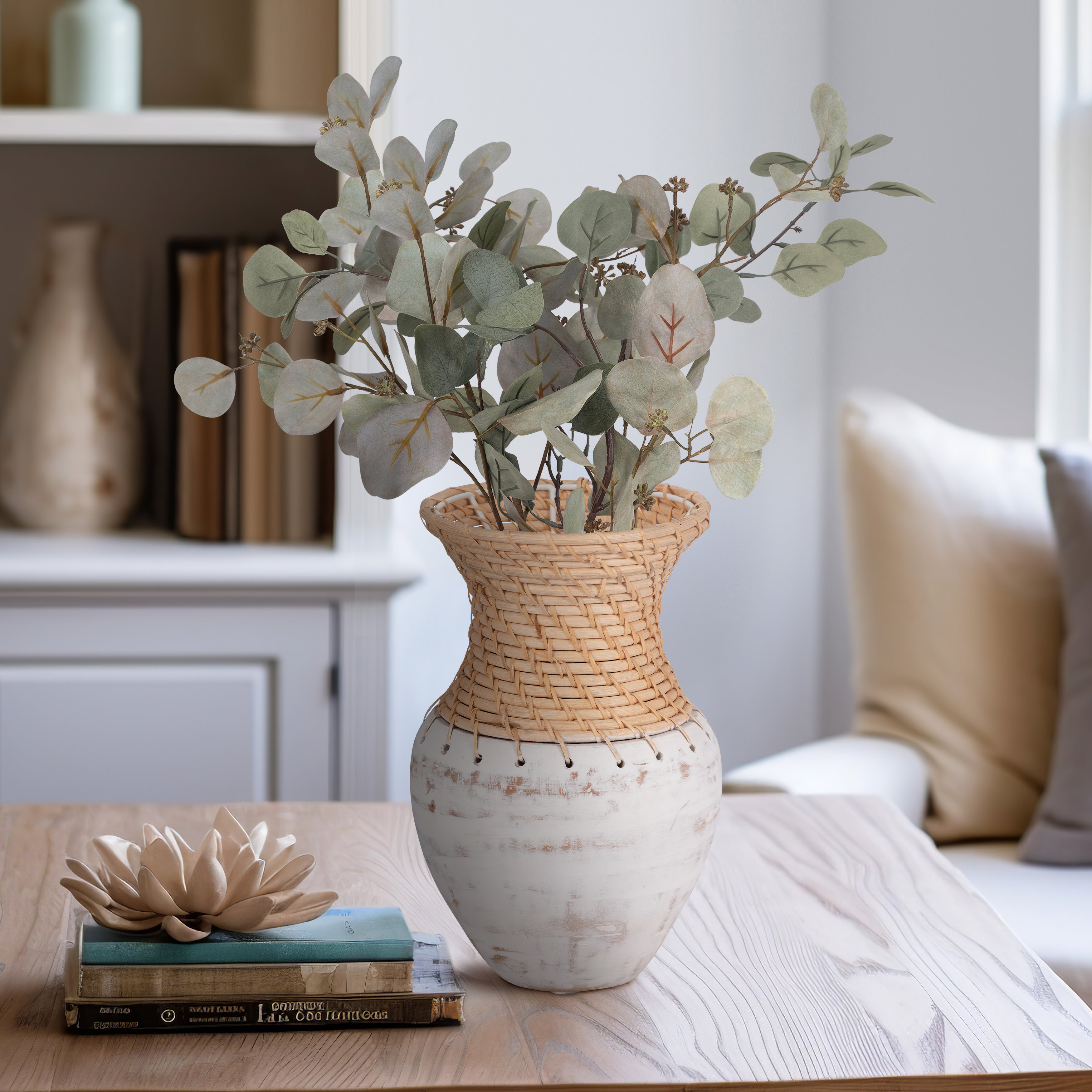 Woven basket and ceramic vase grouping with natural textures and boho styling