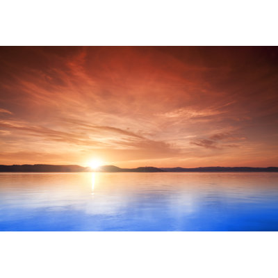 Coucher de soleil sur l'eau par Focusstock