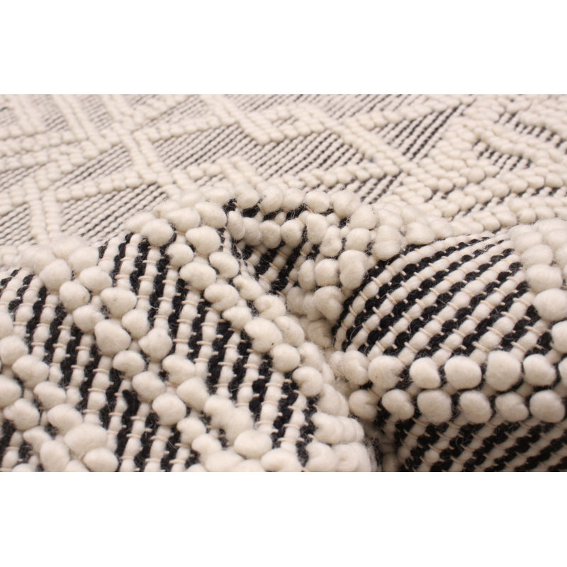Kennidi Cream Rug 5'0" x 8'2"