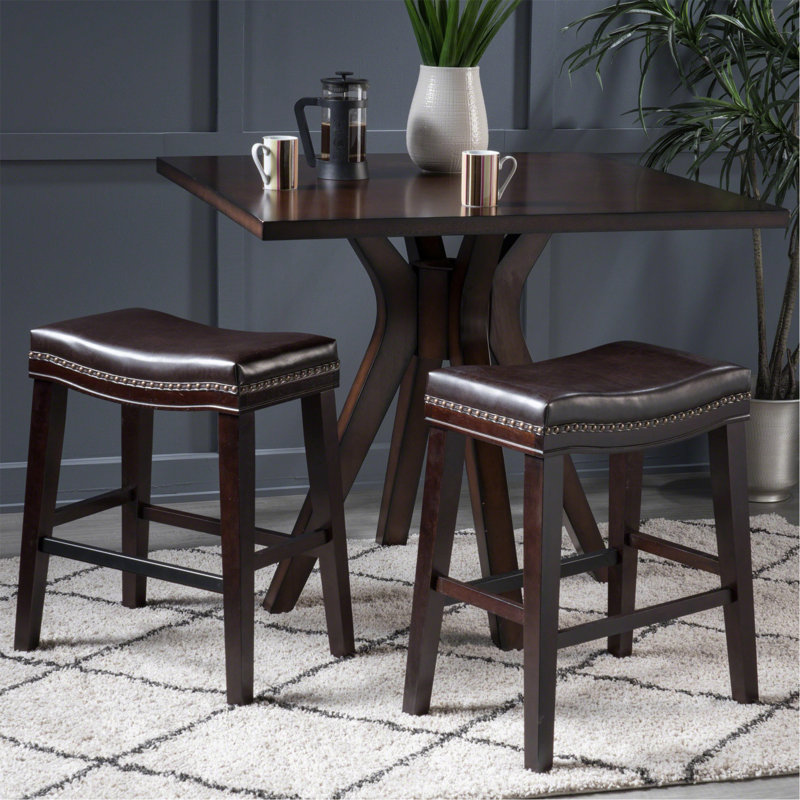 Contemporary Upholstered Saddle Counter Stool With Nailhead Trim And Elegant Design, Ideal For Kitchen And Bar Areas.