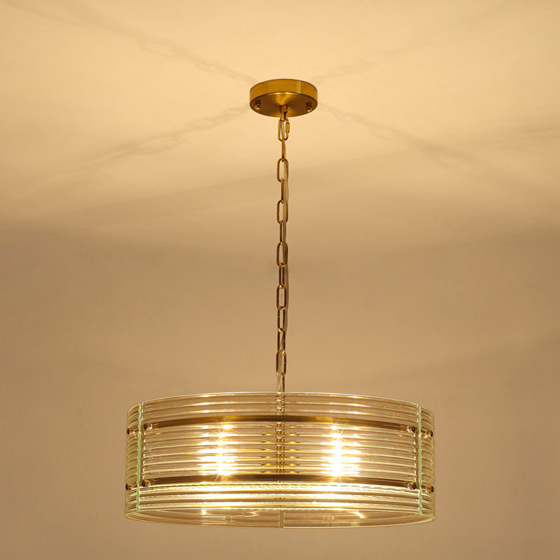 Suspension moderne à 4 lumières en verre côtelé, de forme cylindrique.