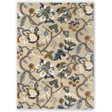 Amanpuri Hand Tufted Floral Area Rug in Stone/Navy