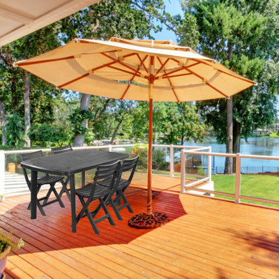 Ahriella 4 - Person Patio Dining Set with Round Table