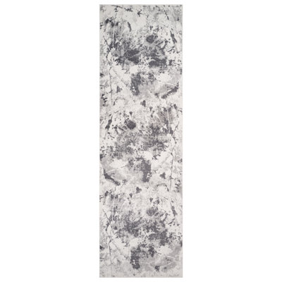 Mackensy Abstract Ivory Power-Loom Area Rug
