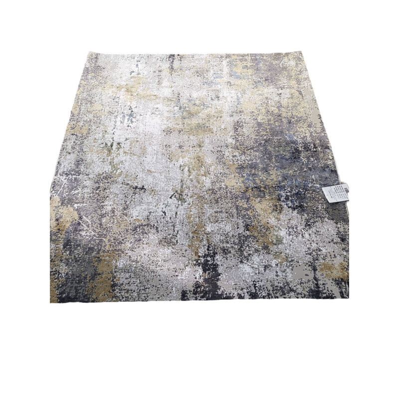 Tapis gris en fibres naturelles