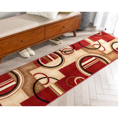 Tapis rouge à motif géométrique Carlecia