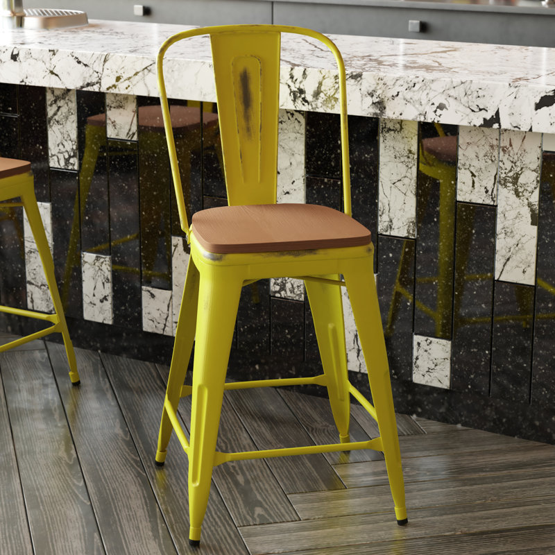Tabouret à hauteur de comptoir toutes saisons avec siège en résine polyester Brinya, Jaune / brun