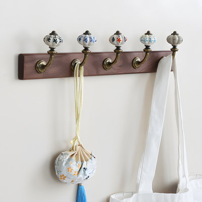 Artisanal Walnut Wall Hook With Hand-Painted Porcelain Sphere