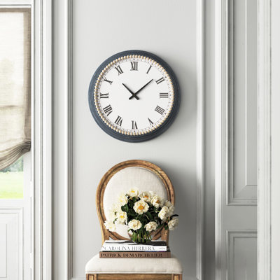 Assitan 22.55" Wall Clock