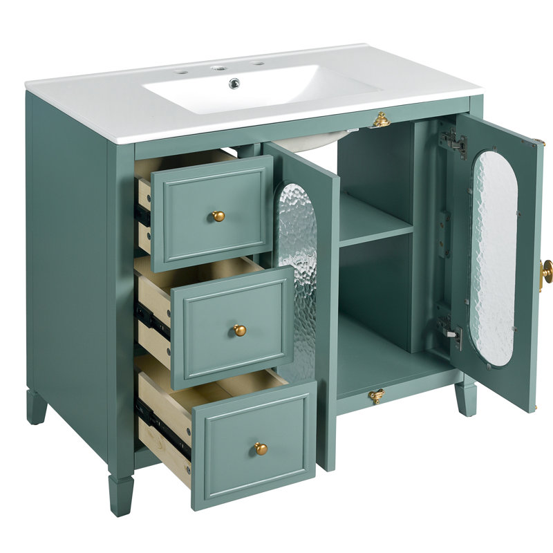 Meuble-lavabo 36 po avec cadre en bois massif, 2 portes à fermeture en douceur. Rangement spacieux 3 tiroirs. Verre translucide pour une touche d'élégance. Fabrication. Facile à assembler et à utiliser. Portes 36 po Lake Essential, bois.