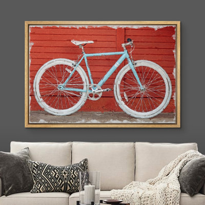 Vélo de route garé par le bois rouge - peinture sur toile à cadre flottant