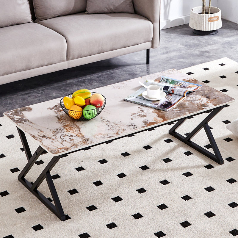 47*23.6 A Coffee Table Is Made Of Rock Slab Material, With A Natural And Smooth Marble Pattern On The Surface, Which Complements The Modern Design Of The Metal Legs And Adds A Touch Of Fashion