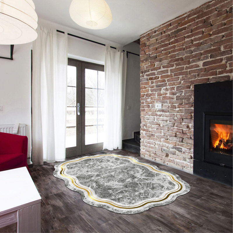 Tapis gris / or en polyester tissé à la machine Novelty Hornersvil, Nouveauté 5 pi 3 po x 7 pi 7 po