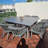 Khadijha 8 - Person Patio Dining Set Square Table with Cushions Included