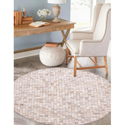Tapis ivoire en patchwork de vache 5 pi 0 po x 5 pi 0 po
