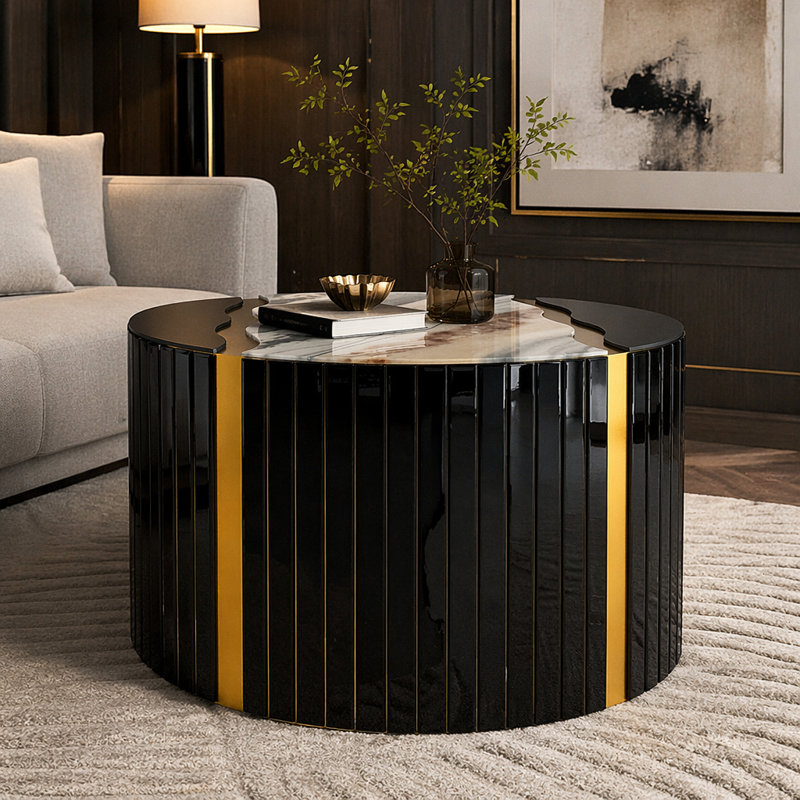 Table basse ronde noire et dorée