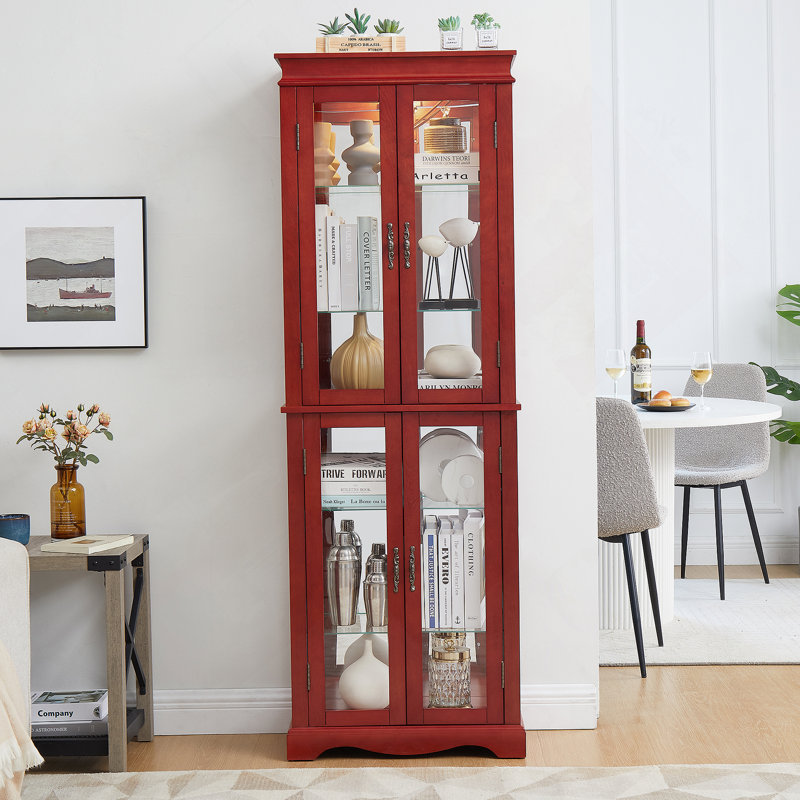 Vitrine lumineuse en verre avec tablettes réglables et éclairage interne, parfaite pour mettre en valeur des objets de collection dans les salons et les cuisines.