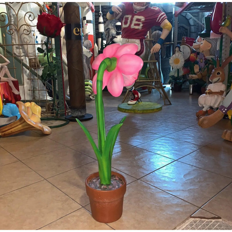 Statue de petit narcis rose en pot