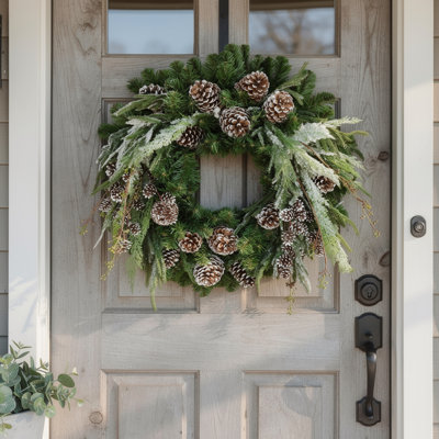 26" Holiday Evergreen Wreath With Snowy Branches And Pinecones
