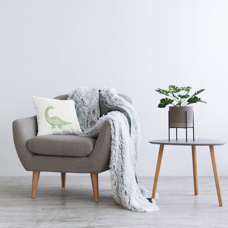 Coussin vert avec motif de dinosaure amusant par Lucille Price