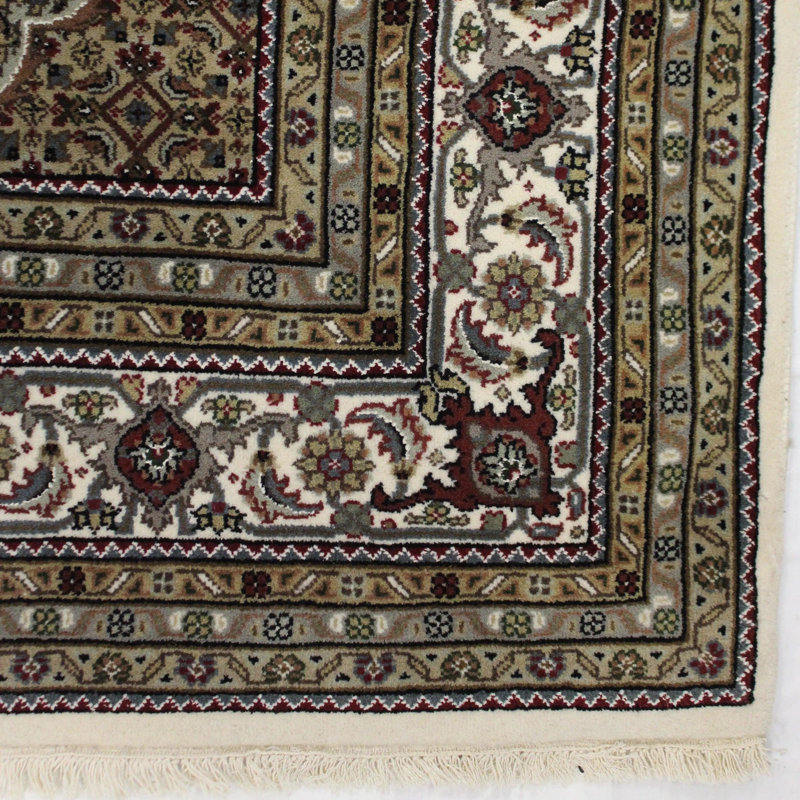 Terrice Southwestern Area Rug in Ivory