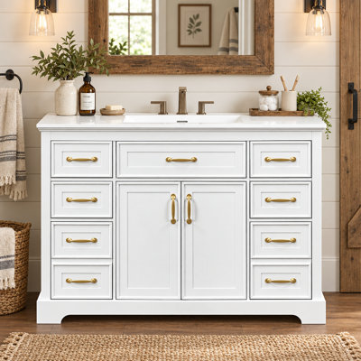 Meuble-lavabo blanc de 121,4 cm (47,8 po) avec lavabo, 6 tiroirs et 2 portes à fermeture amortie, structure robuste.