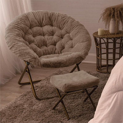 Fauteuil à soucoupe avec repose-pieds