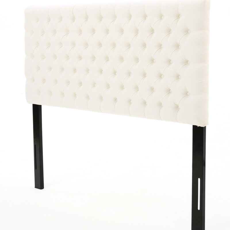Élégante tête de lit pour grand lit, avec un design moderne et chic, un capitonnage à losanges robuste et élégant