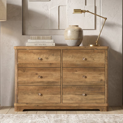 Commode 6 tiroirs avec base sculptée Burkhart