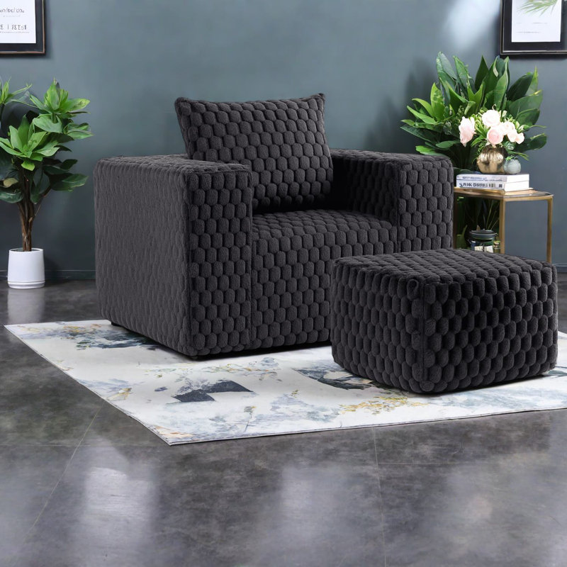 Fauteuil d'appoint moderne en velours côtelé peu encombrant, canapé simple noir avec repose-pieds, idéal pour les espaces de vie compacts