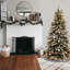 The Holiday Aisle® 7.5ft. Snowy Mountain Pine Slim Pine Tree with Clear Lights