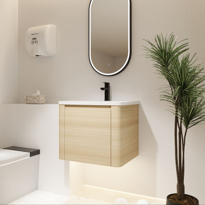 Meuble-lavabo mural avec lavabo en céramique et porte à fermeture en douceur