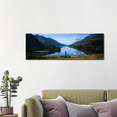 Glenfinnan Monument & Loch Shiel, Glenfinnan, Highlands, Scotland, United Kingdom by Panoramic Images - Wrapped Canvas Panoramic Print