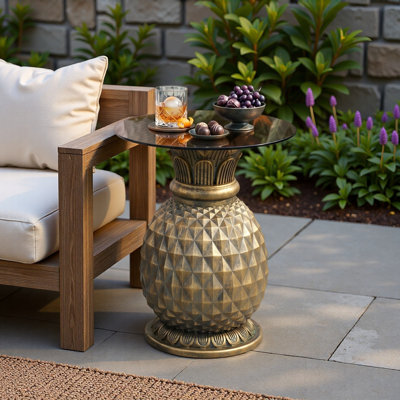 Table d'appoint ananas de 60 cm de hauteur avec plateau en verre, idéale pour l'extérieur (terrasse, jardin) ou comme support pour plantes d'intérieur.